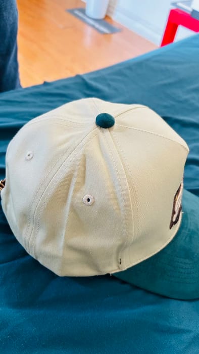 Cream baseball cap with patch by The Fame Lee Clothing